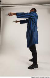 Garson STANDING POSE WITH GUNS 